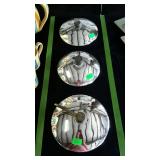 Three oil lamp reflectors. Two are 8", one is 9".