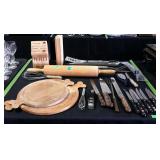 Kitchen wares. Knives, cutting boards, utensils,