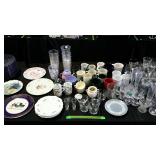 Kitchen wares: glassware, mugs, plates.