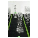 Etched glass decanter with six matching stemware
