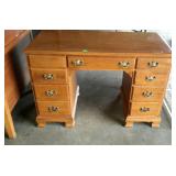 Knee hole desk, with 9 drawers, is missing some