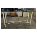Metal sofa table with brass accents and beveled