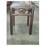 Occasional table with carved leaves on all four