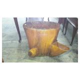 Natural tree trunk section. Can be a table or