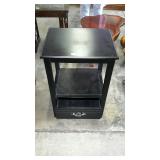 Black bedside stand, with secondary shelf and