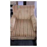 Early easy chair having the gold tone and like