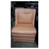 Bedroom slipper chair in nice peach colored
