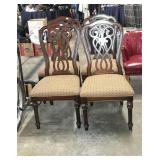 Contemporary dining chairs with scroll backs,
