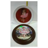 Two Shirley Temple collectors plates one with the
