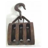 Triple wooden pulley