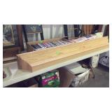 Natural colored wall shelf mantle in its design,