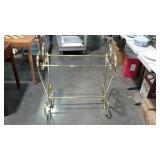 Brass quilt rack, measures 31 inches long