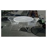 Wrought iron patio table and 2 chairs