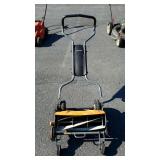 Fiskars adjustable height reel mower.