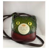 Leather shoulder purse with "cat face" and long