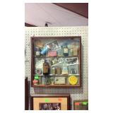 Wall decor trinket shelf with drug store items