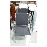 Two lobby chairs, stainless frames black fabric