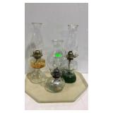 Three oil lamps