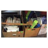 Three boxes with magazines, VHS tapes, etc