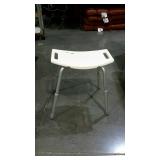 Adjustable shower seat