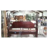 Four poster bed with wooden side rails, fluted