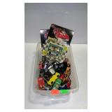 Plastic tote filled with Nascar cars