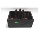 Wooden crate with five shoe lasts