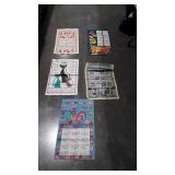 Five burlap bags with calendars prints on them