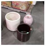 Group of three plastic planters