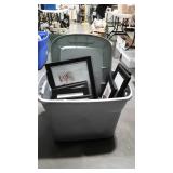 Grey tote full of picture frames