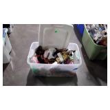 Clear plastic tote full of Barbie dolls, seller