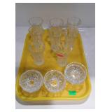 Set of eight glass candle chimneys with drip cups