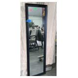 Black framed closet mirror. 15"×54". Seller code