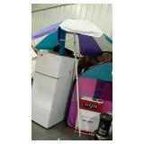 Beach umbrella with storage/carry bag.