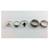 Five Sterling silver rings mixed sizes