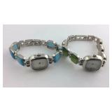 Two wrist watches not running