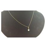 10kt gold necklace has a small knot in chain