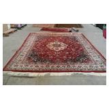 Nice, clean area rug. Red with ivory border and