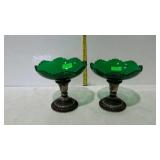 Two sterling weighted candlestick holders with