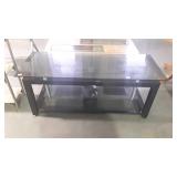 Black glass tv stand, measures 52 inches long, by