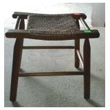 Caned wooden stool, measures 17 inches tall