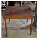 Wooden table, measures 36 inches long, by 34