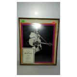 Elvis Presley photo with in memoriam program,