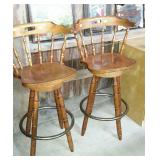 Two swivel bar stools, measures 41 inches tall