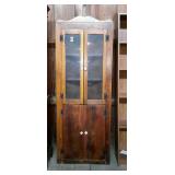 Pine corner cupboard with solid bottom doors and