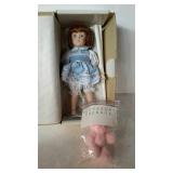 Porcelain collector doll by the Danbury Mint.