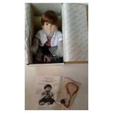 Porcelain collector doll by the Danbury Mint.