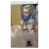 Porcelain collector doll by the Danbury Mint.