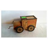 Wooden Coca-Cola truck with music box. 10" long,