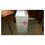 Two drawer filing cabinet, measures 27 inches